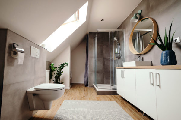 Large modern bathroom with luxury fittings. Modern bathroom interior. Luxury apartment. Bathroom with walk in shower.