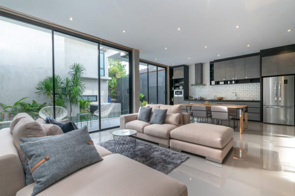interior home design in living room with open kitchen in the loft house